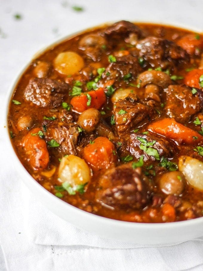 beef-bourguignon Bowl of Homemade Beef Bourguignon with carrots and potatoes