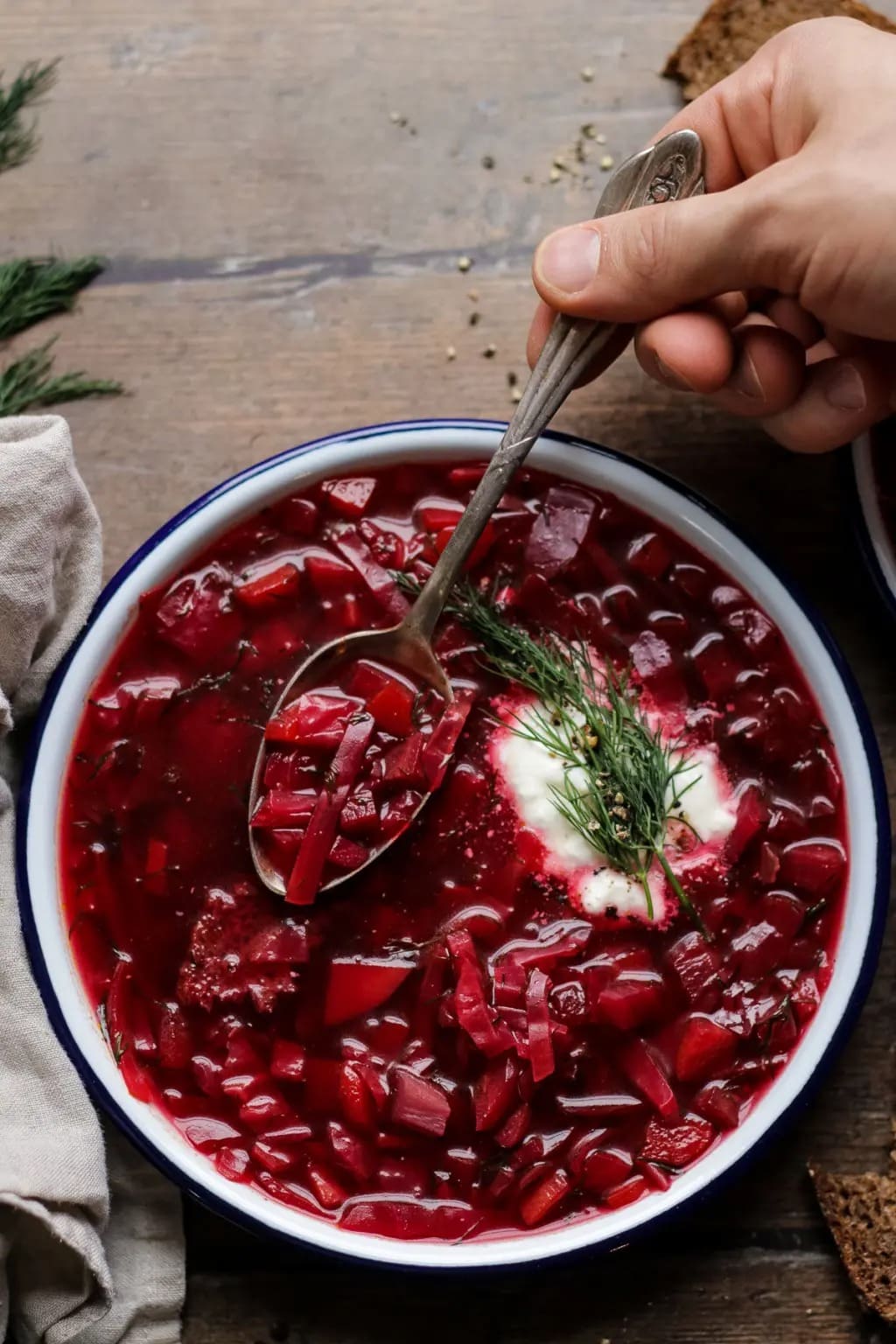 borscht Bowl of homemade Borscht carrots, onions, red beets, potatoes, white cabbage and minced garlic