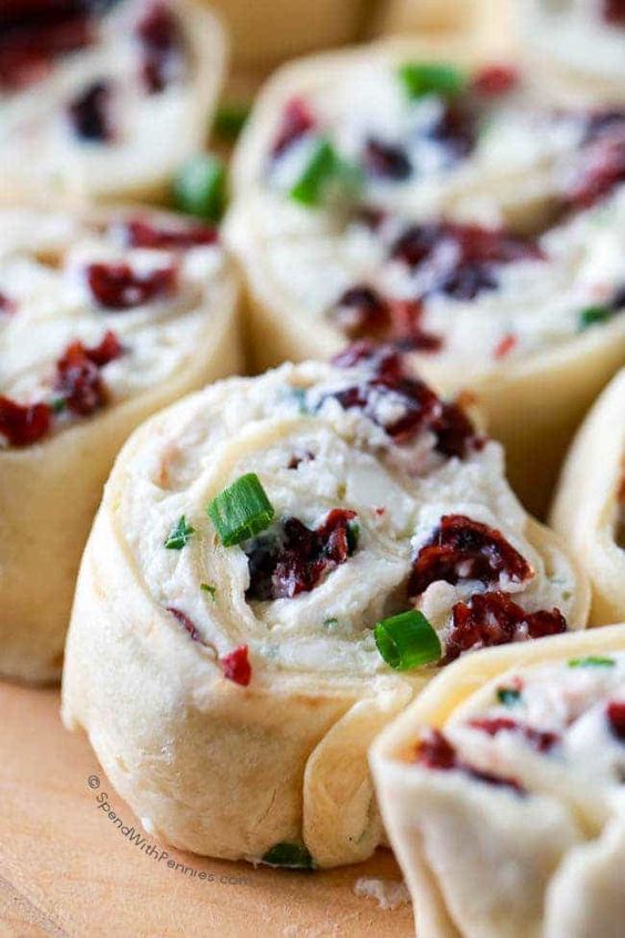 cranberry-feta-pinwheels Homemade Cranberry Feta Roll-Ups with Chopped Green Onions