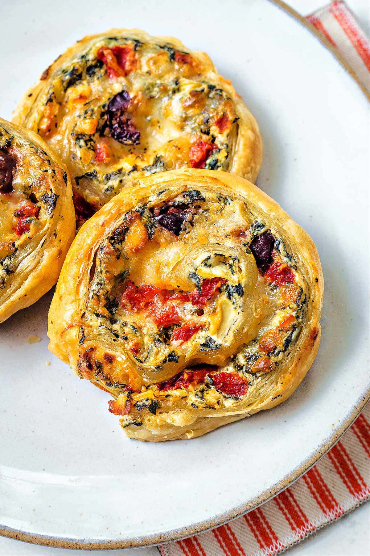 mediterranean-appetizer-pinwheels Greek Puff Pastry Pinwheels with Olives, Spinach, Feta and Peppers