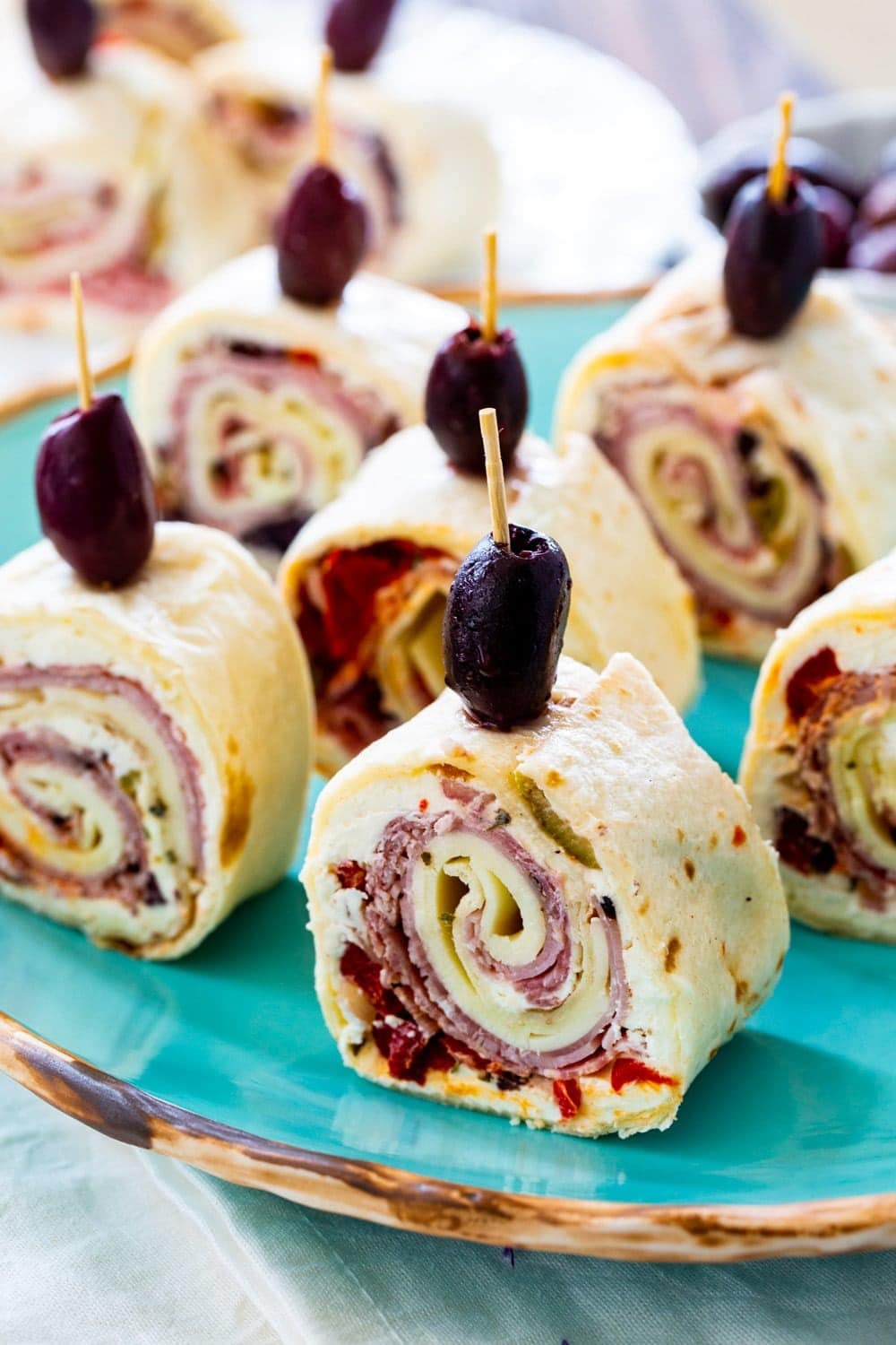 muffaletta-pin-wheels Muffuletta Pinwheels with Olives, Peppers, Onions and Meat