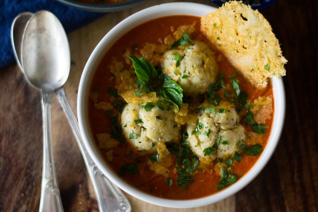roasted-tomato-and-matzo-ball-soup Bowl of homemade Roasted Tomato and Matzo Ball Soup