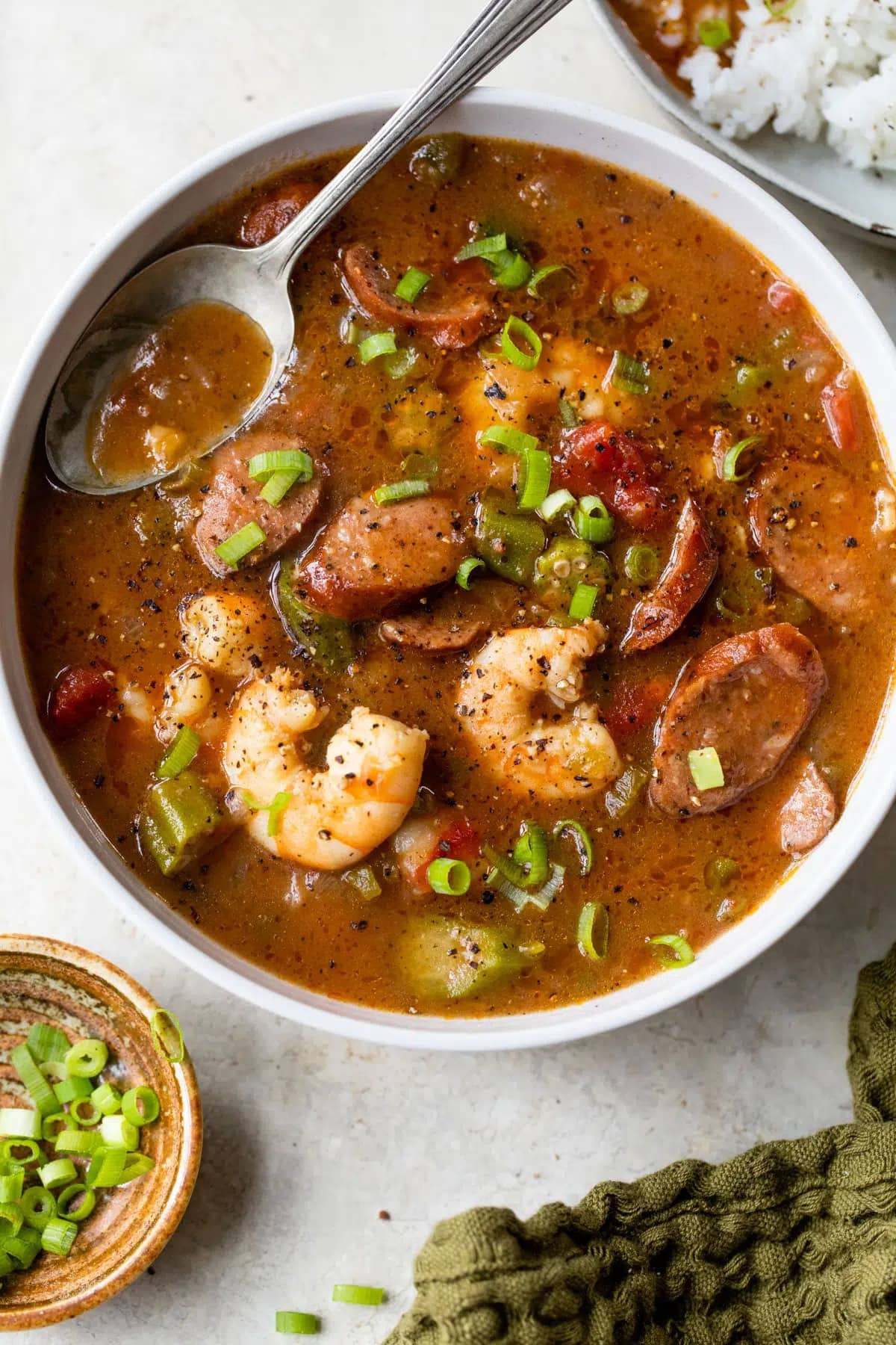shrimp-and-sausage-gumbo Bowl of homemade saucy Shrimp and Sausage Gumbo