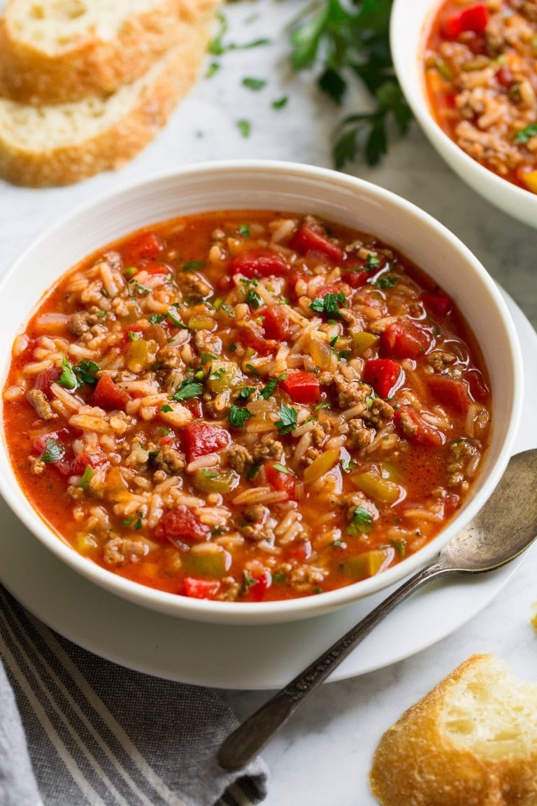 stuffed-pepper-soup-4 Bowl of homemade Stuffed Pepper Soup on a table sliced bread