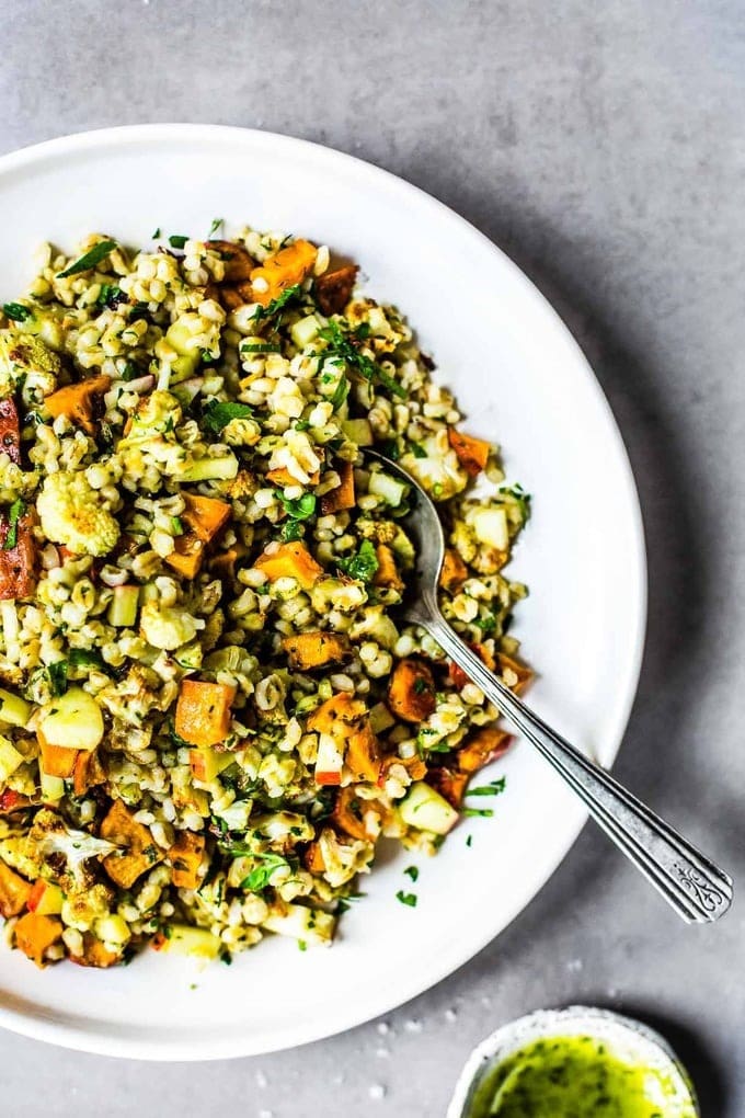autumn-glow-salad Autumn glow salad with mix of sweet potato, crispy apple, roasted cauliflower, fresh parsley, and freekeh grains.