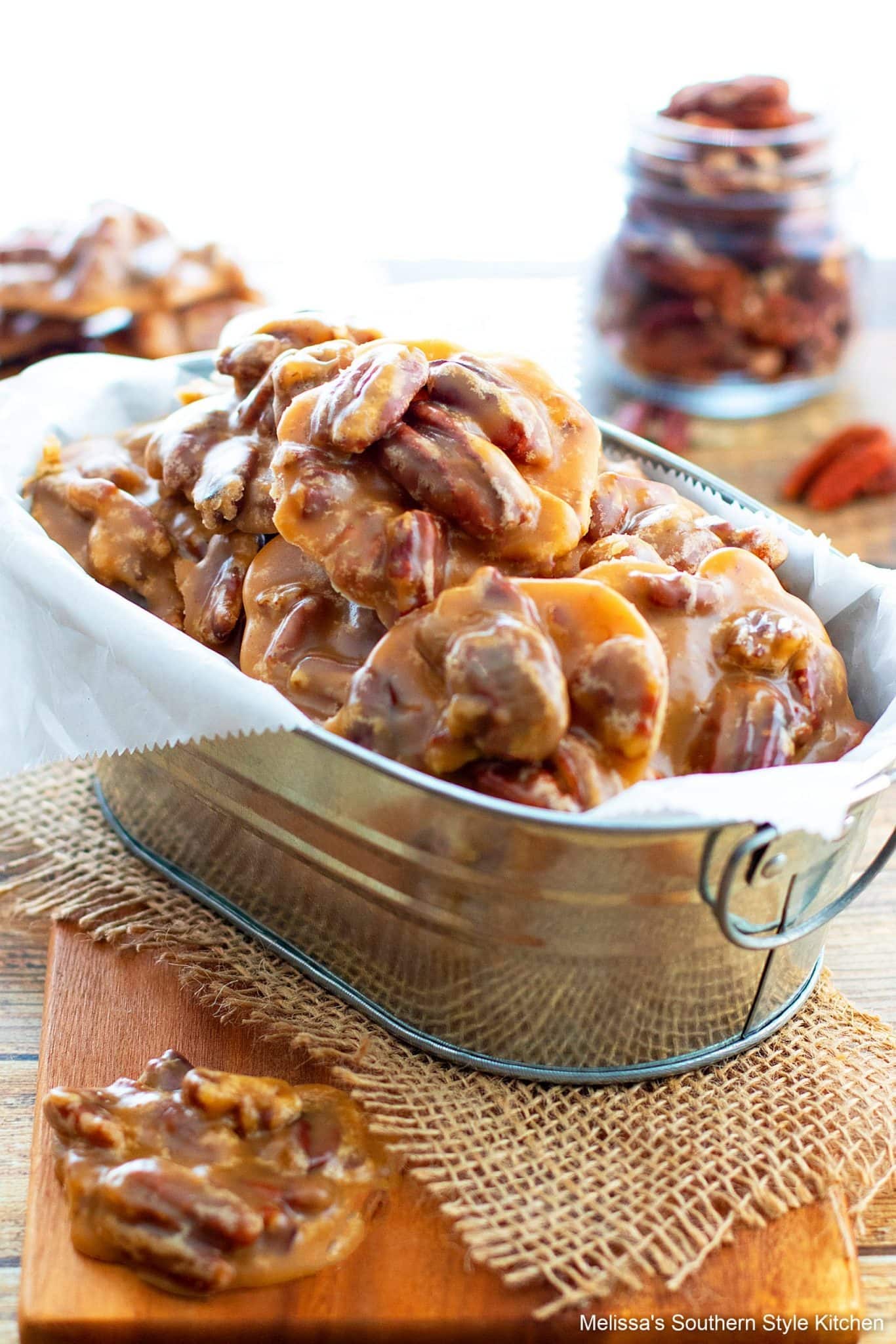 bourbon-pecan-pralines Bunch of Bourbon Pecan Pralines on a can with parchment paper