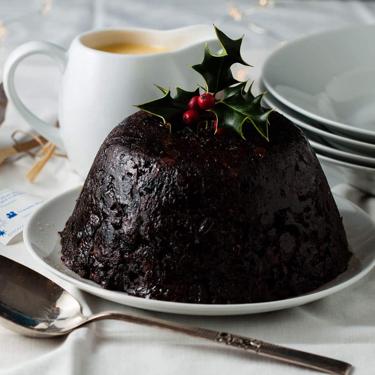 Chocolate pudding cake topped with fresh berries.