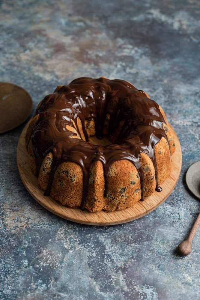 chocolate-chip-bundt-cake Chocolate Bundt cake topped with chocolate syrup.