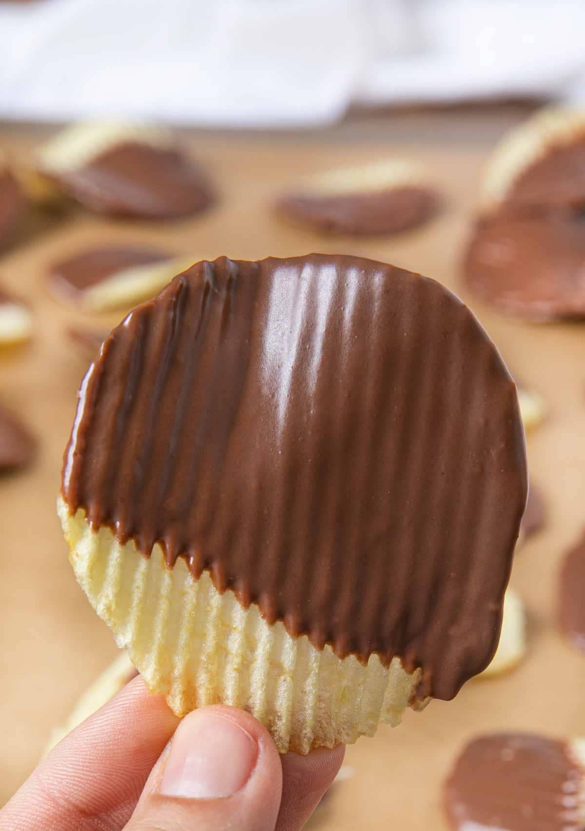 chocolate-covered-potato-chips Close up view of Chocolate Covered Potato Chip