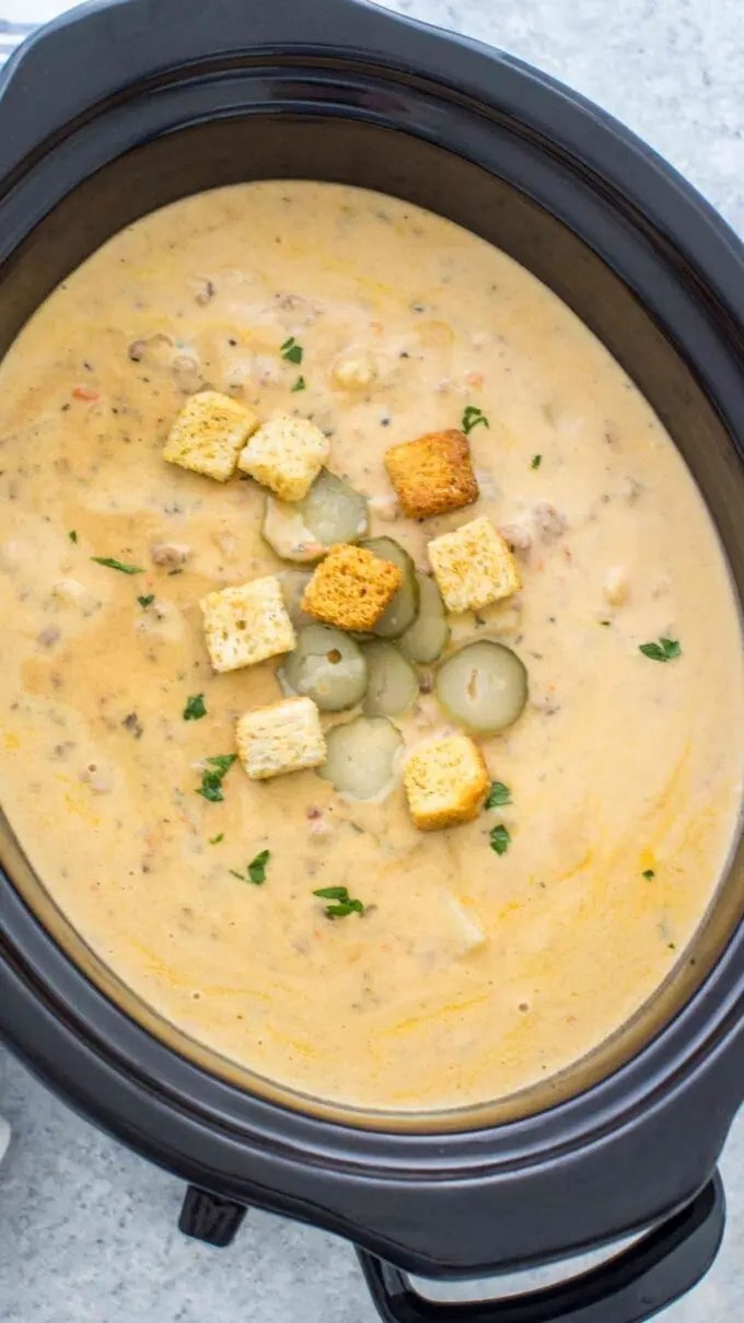 crockpot-cheeseburger-soup Top view of cheeseburger soup in a Crockpot.