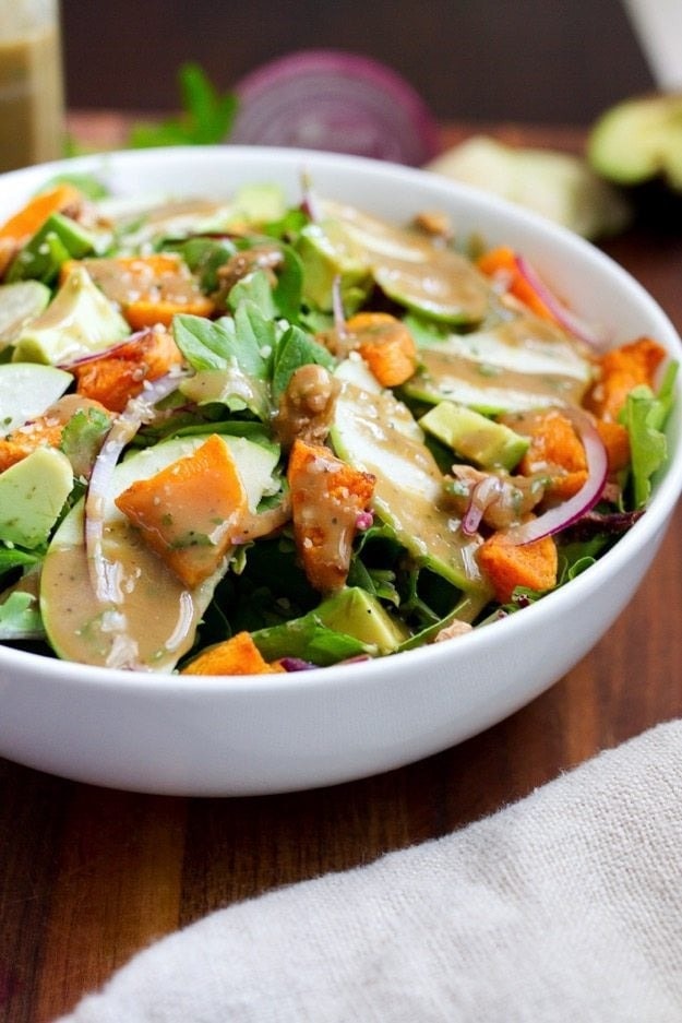 fall-harvest-breakfast-salad Fall harvest breakfast salad with cinnamon-roasted butternut squash, apple slices, avocado, red onion, walnuts, and hemp seeds.