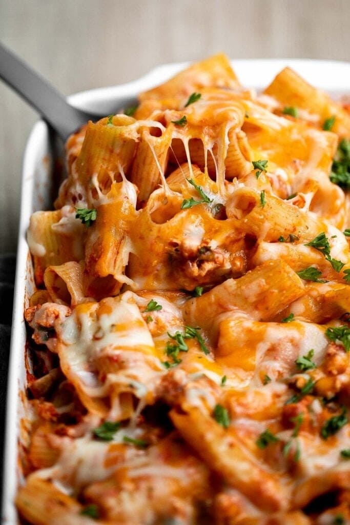 ground-turkey-pasta-bake Cheesy ground turkey pasta bake on a baking dish.