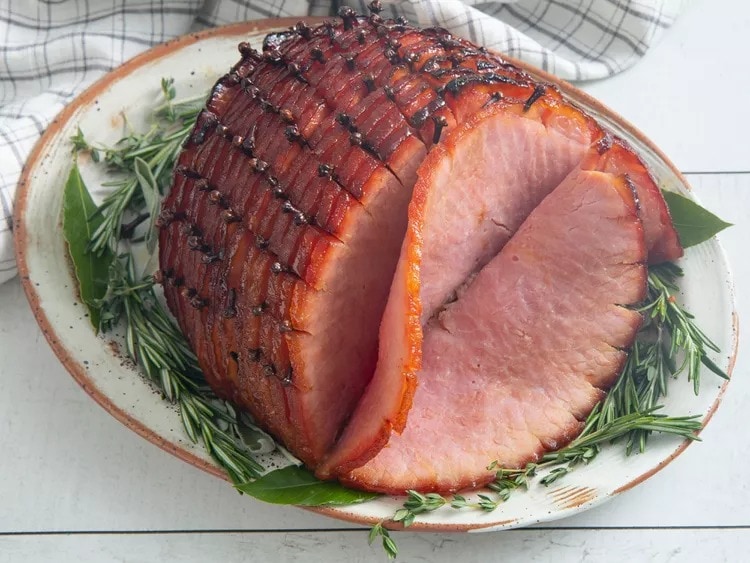 honey-glazed-ham Sliced honey-glazed ham.
