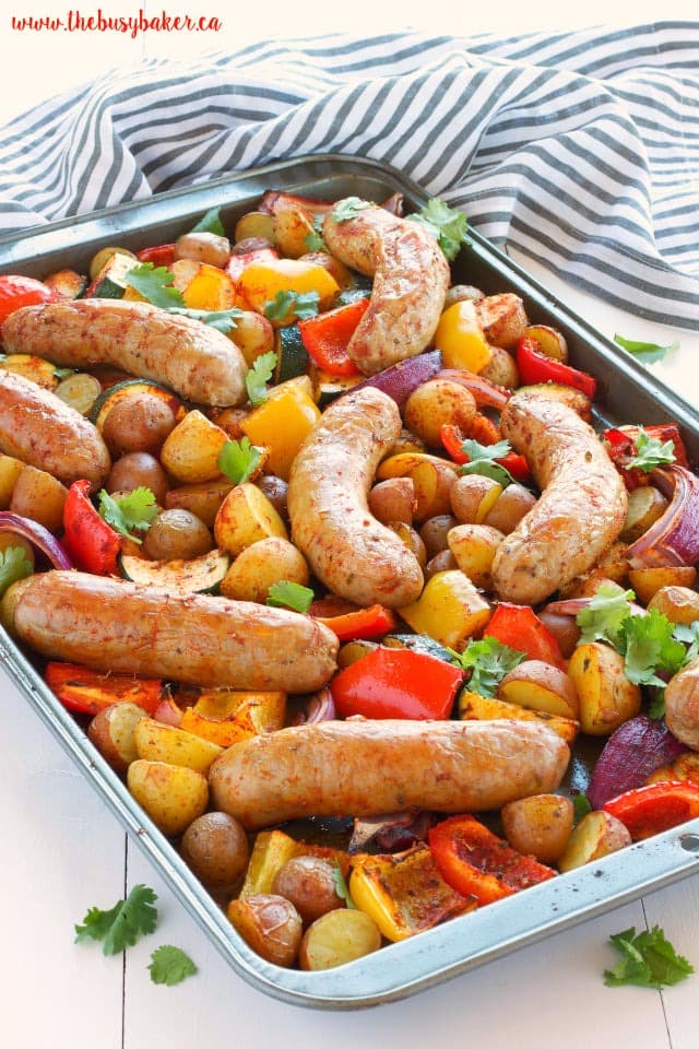 italian-sausage-sheet-pan-1 Sheet pan with roasted juicy sausages, tender baby potatoes, sweet bell peppers, zucchini, and red onions.