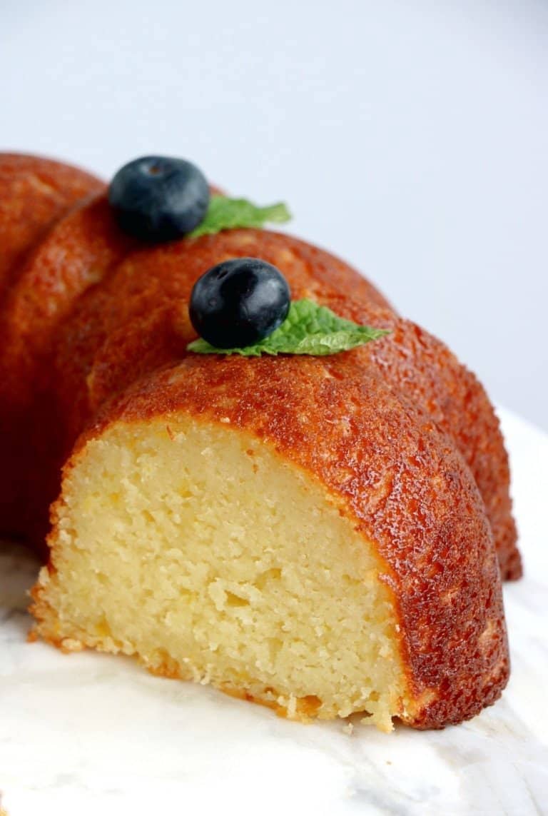 perfect-lemon-ricotta-bundt-cake Sliced portion of ricotta Bundt cake.