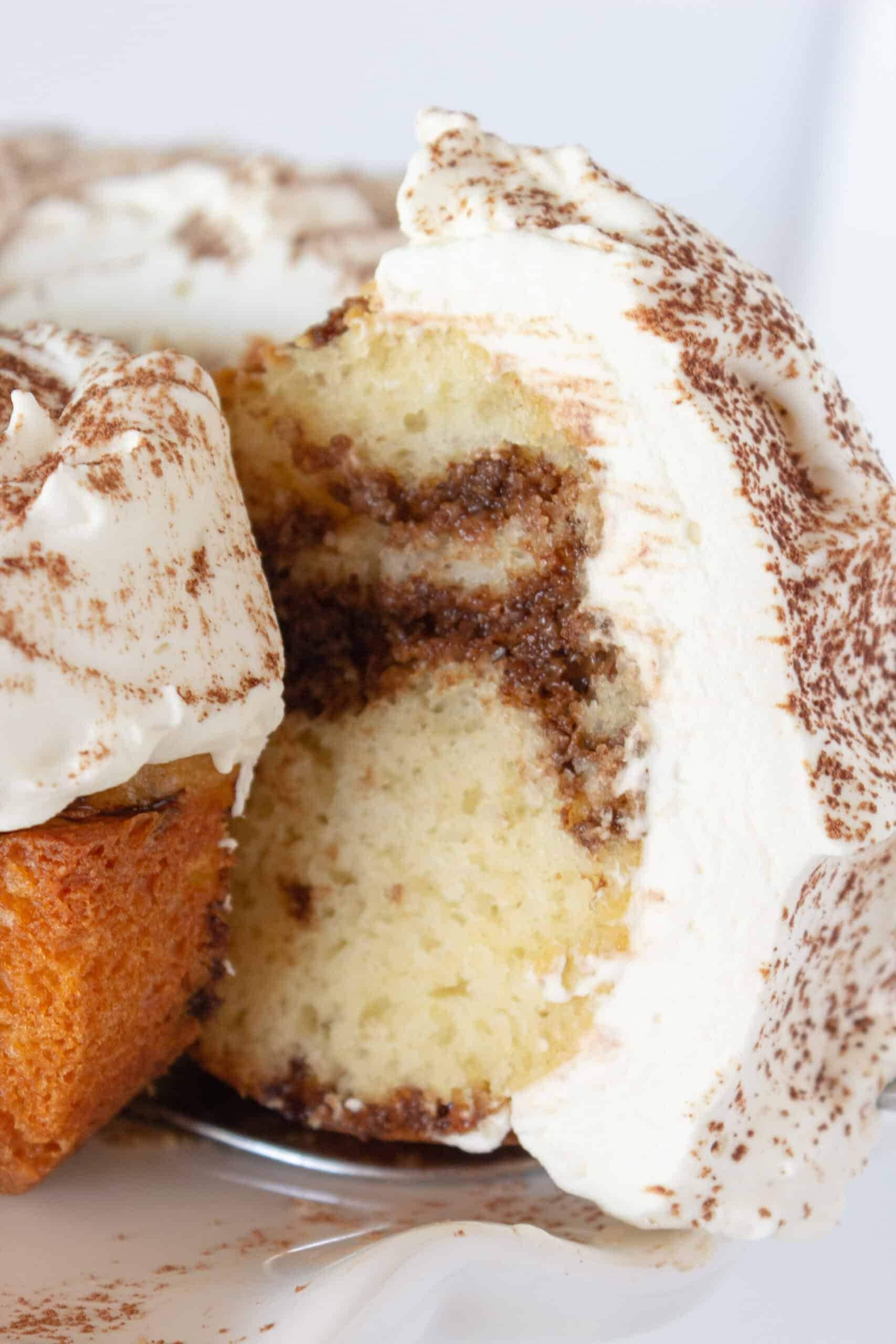 tiramisu-bundt Sliced portion of a tiramisu bundt cake with icing
